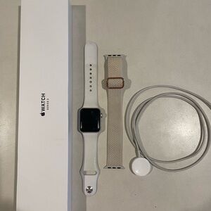 Apple Watch Series 3 with White and Tan Bands